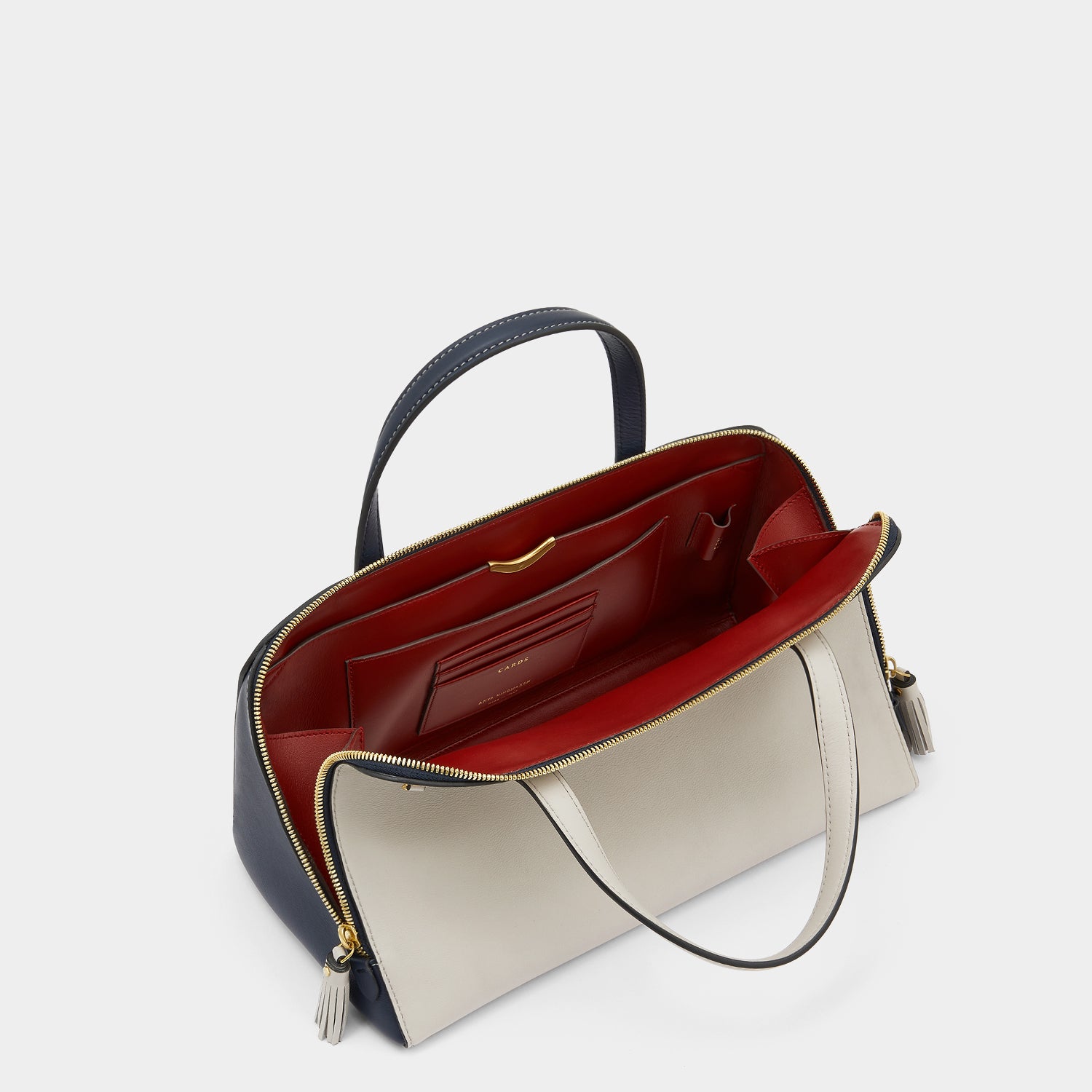 Wedge Cross-body -

                  
                    Calf Leather in Steam -
                  

                  Anya Hindmarch UK

