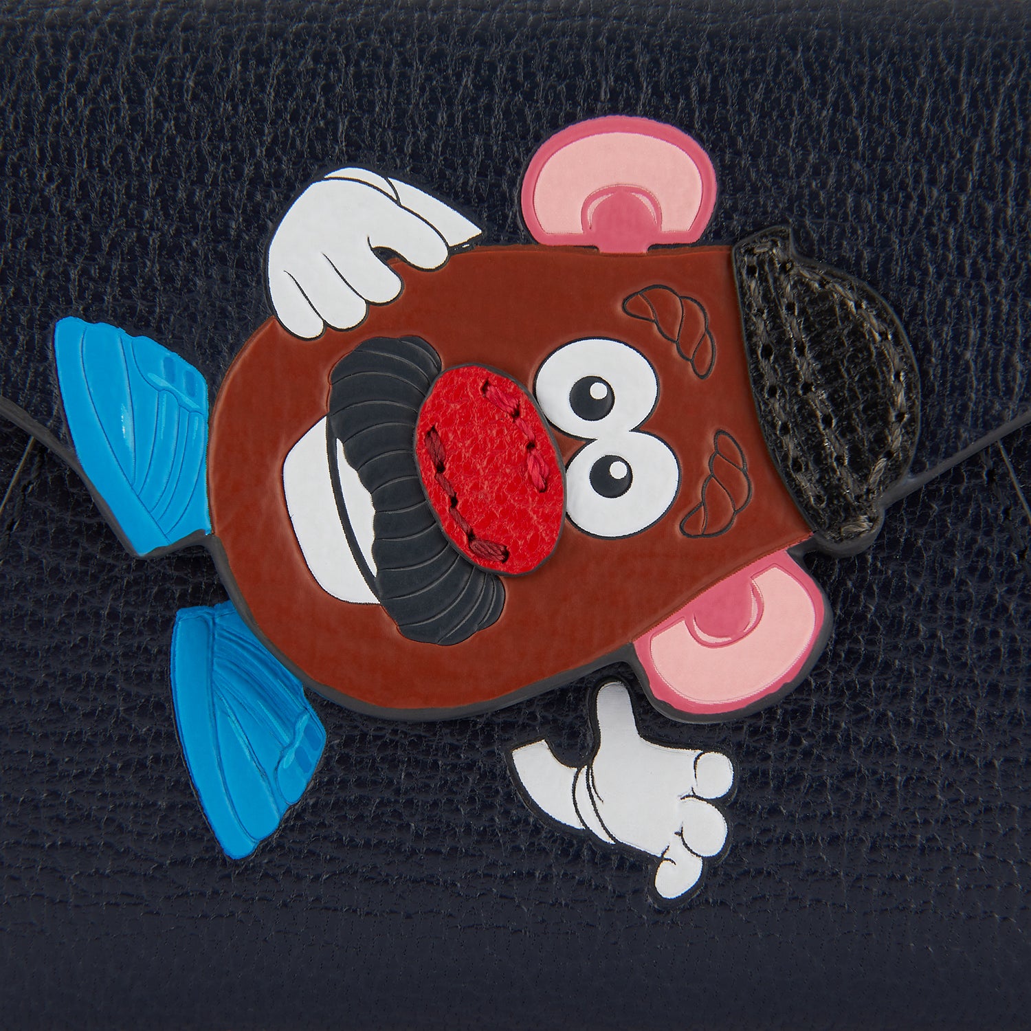 Mr Potato Head Mini Trifold -

                  
                    Capra Leather in Ink -
                  

                  Anya Hindmarch UK
