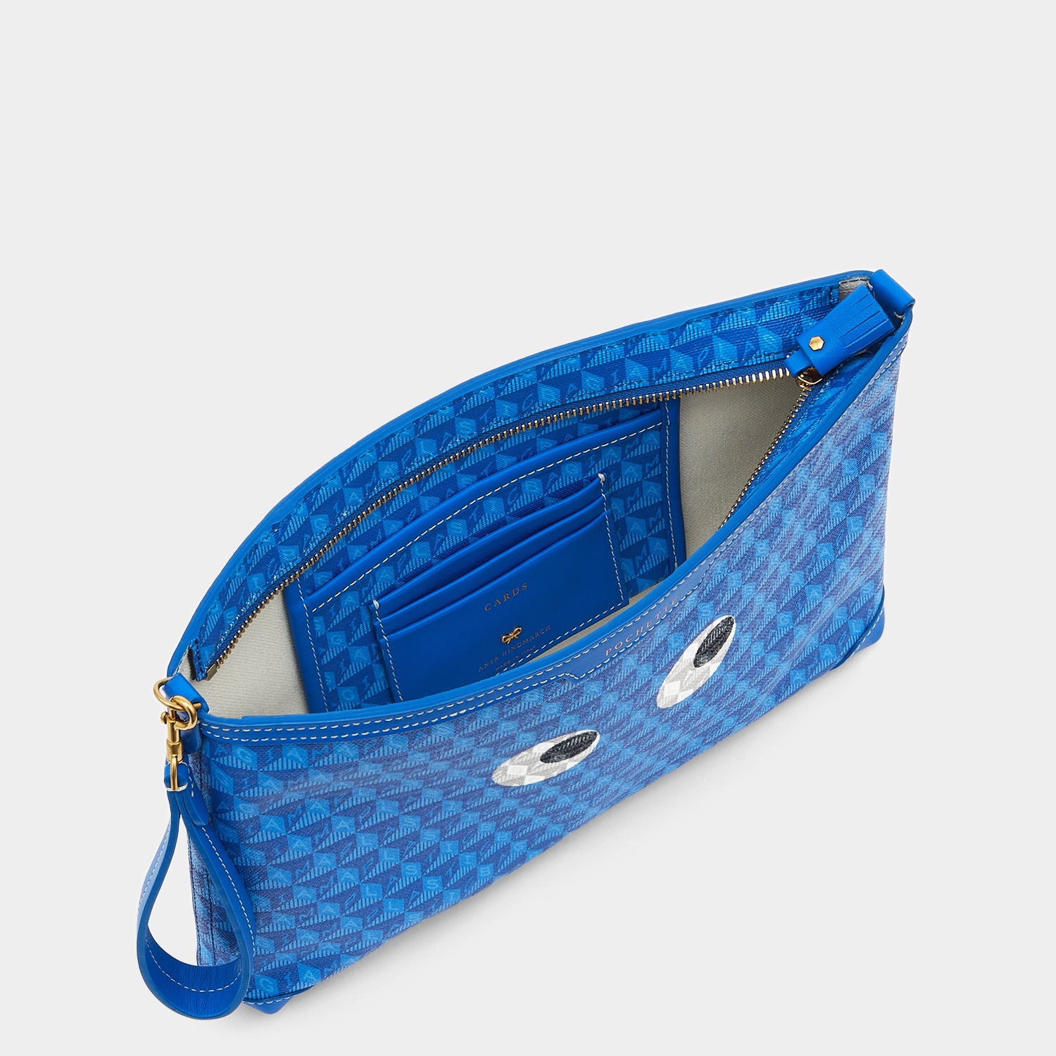I Am A Plastic Bag Eyes Pochette -

                  
                    Recycled Canvas in Electric Blue -
                  

                  Anya Hindmarch UK
