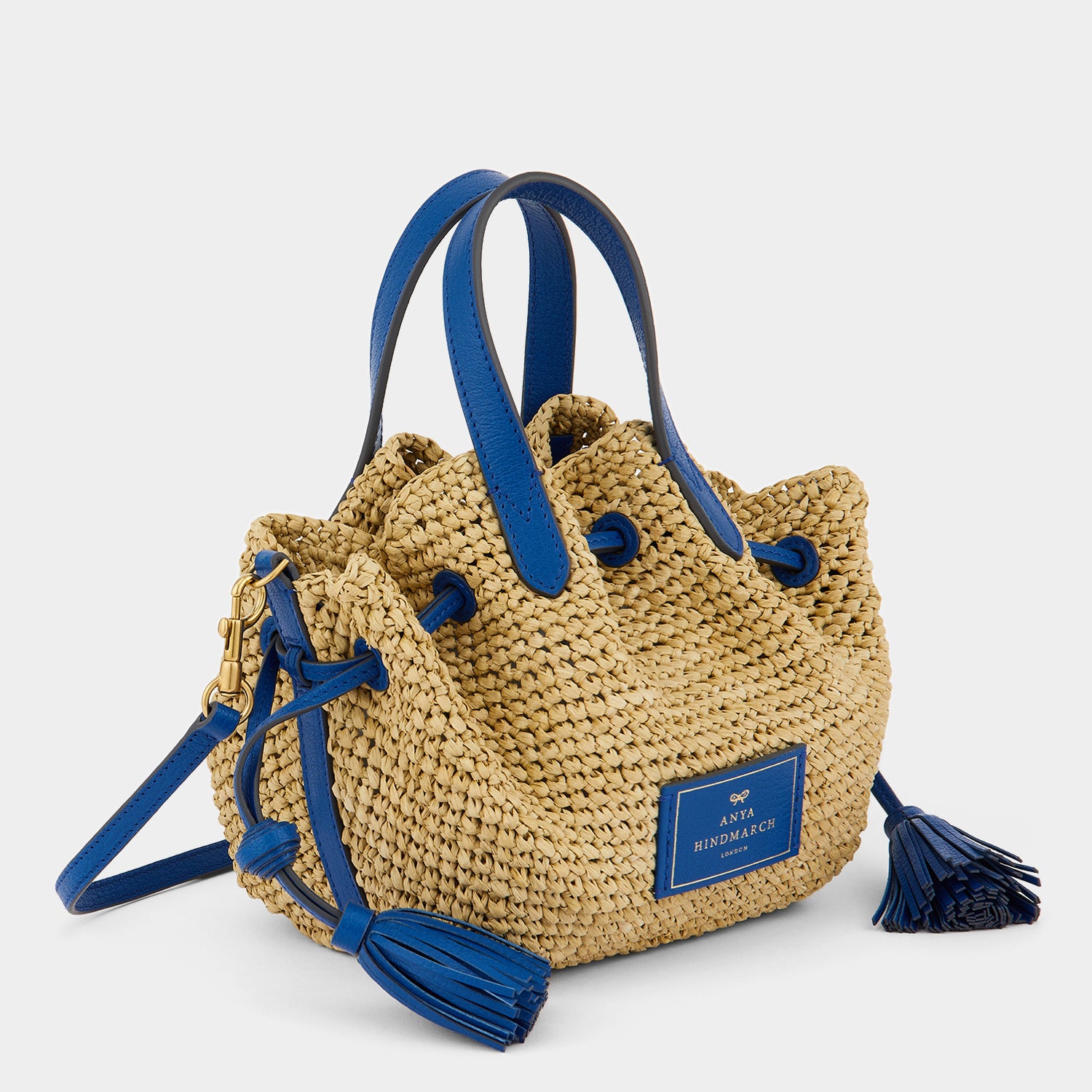 Raffia Drawstring Small Tote -

                  
                    Leather in Electric Blue -
                  

                  Anya Hindmarch UK
