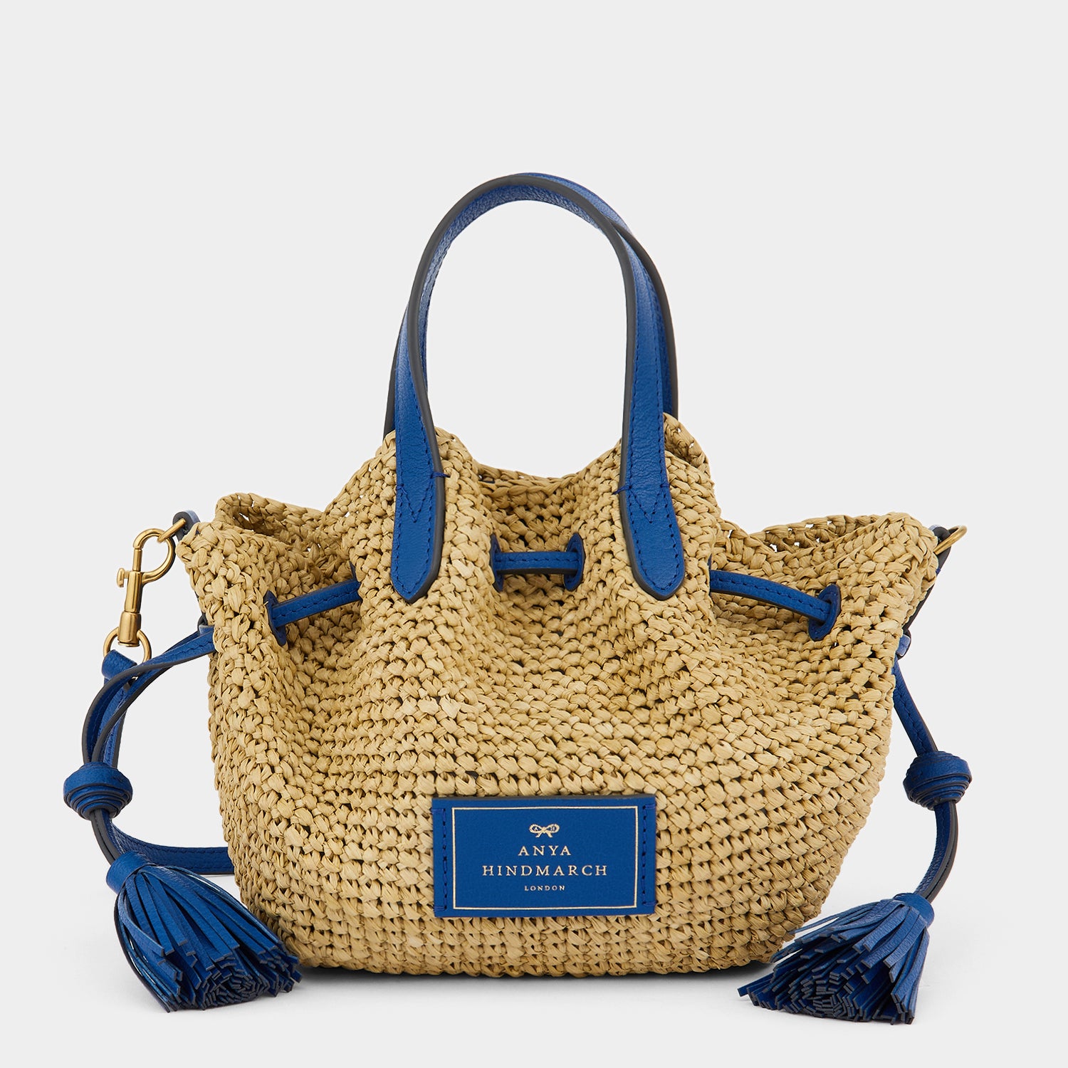 Raffia Drawstring Small Tote -

                  
                    Leather in Electric Blue -
                  

                  Anya Hindmarch UK
