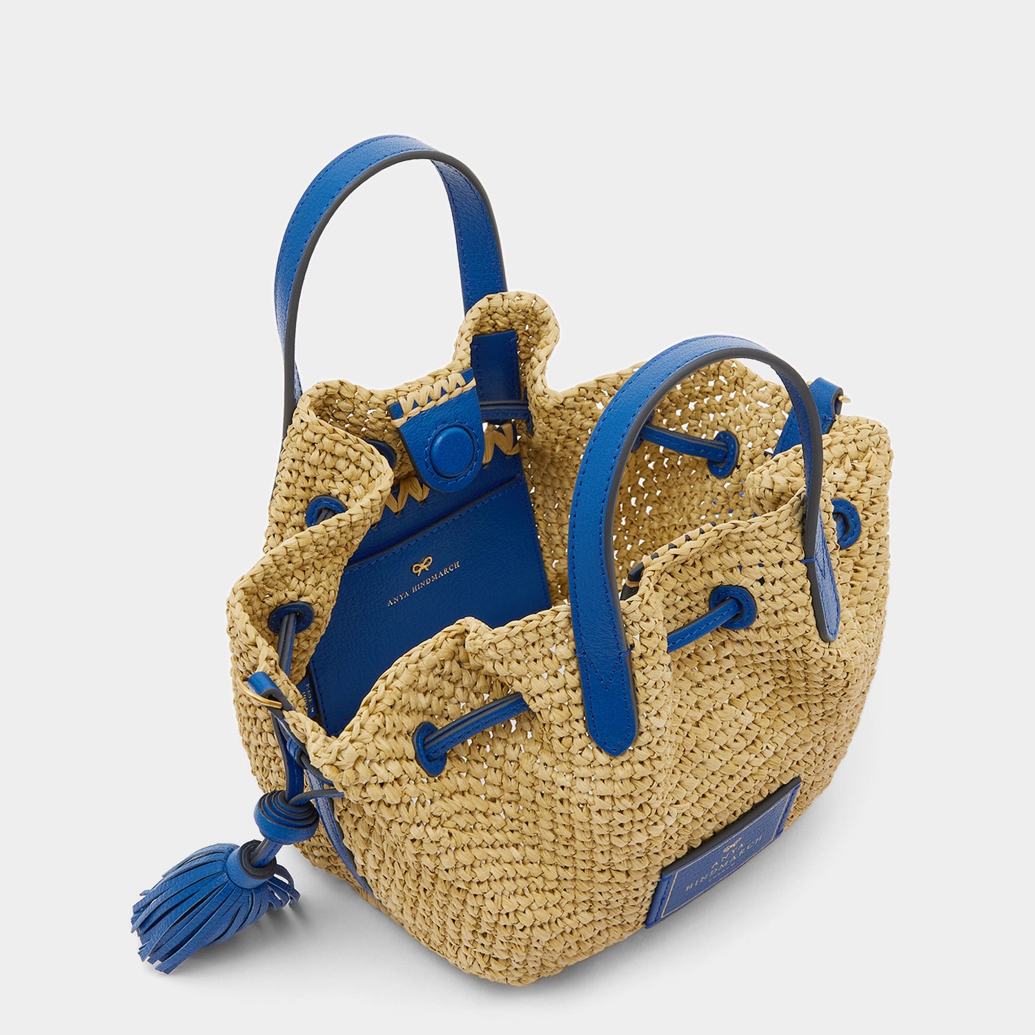 Raffia Drawstring Small Tote -

                  
                    Leather in Electric Blue -
                  

                  Anya Hindmarch UK
