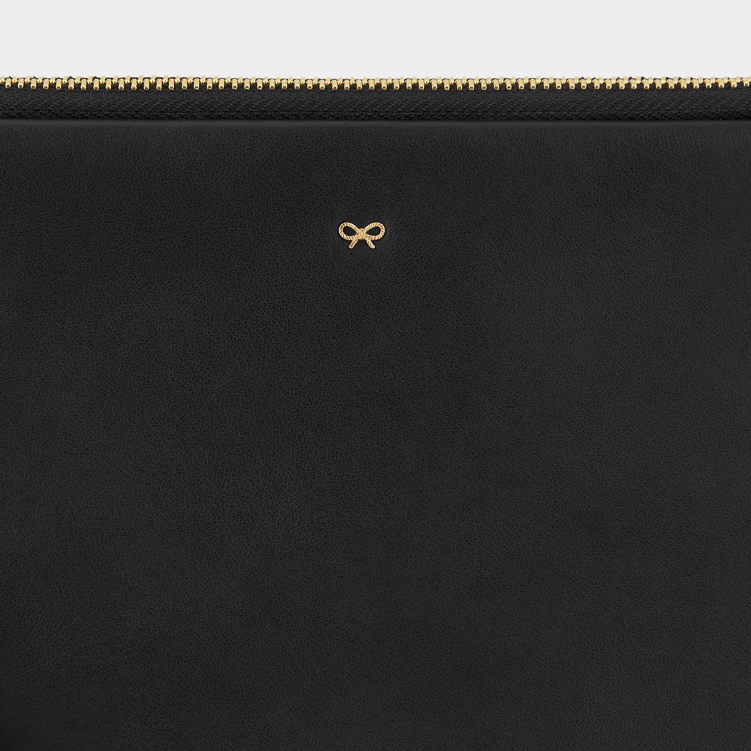 Georgiana Clutch -

                  
                    Circus Leather in Black -
                  

                  Anya Hindmarch UK
