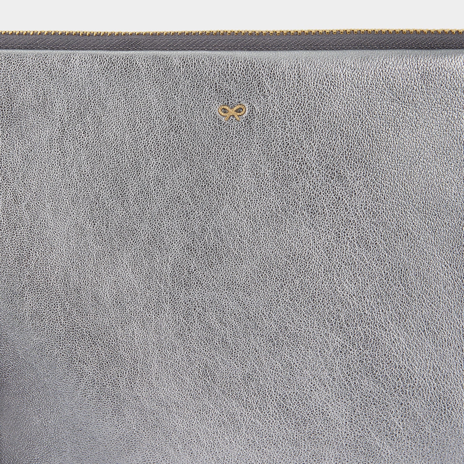 Georgiana Clutch -

                  
                    Metallic Leather in Steel -
                  

                  Anya Hindmarch UK
