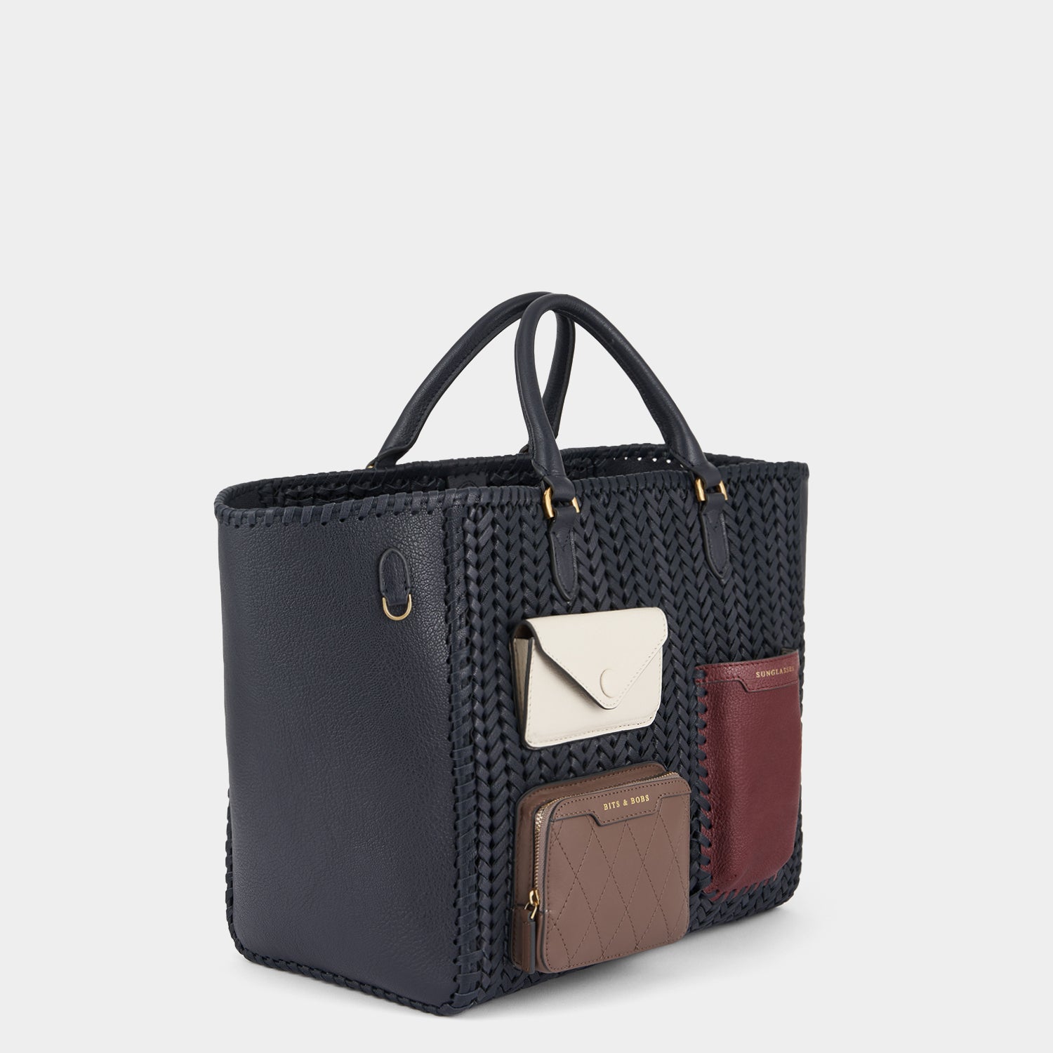 Neeson Multi Pocket Square Tote -

                  
                    Capra Leather in Marine -
                  

                  Anya Hindmarch UK
