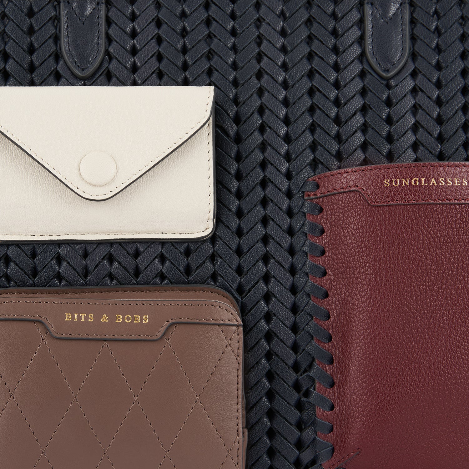 Neeson Multi Pocket Square Tote -

                  
                    Capra Leather in Marine -
                  

                  Anya Hindmarch UK
