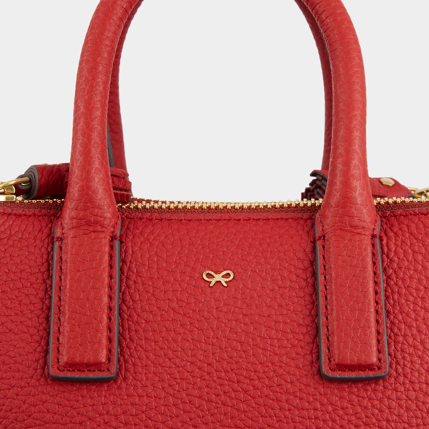 Micro Ebury -

                  
                    Tumbled Matt Leather in Red -
                  

                  Anya Hindmarch UK
