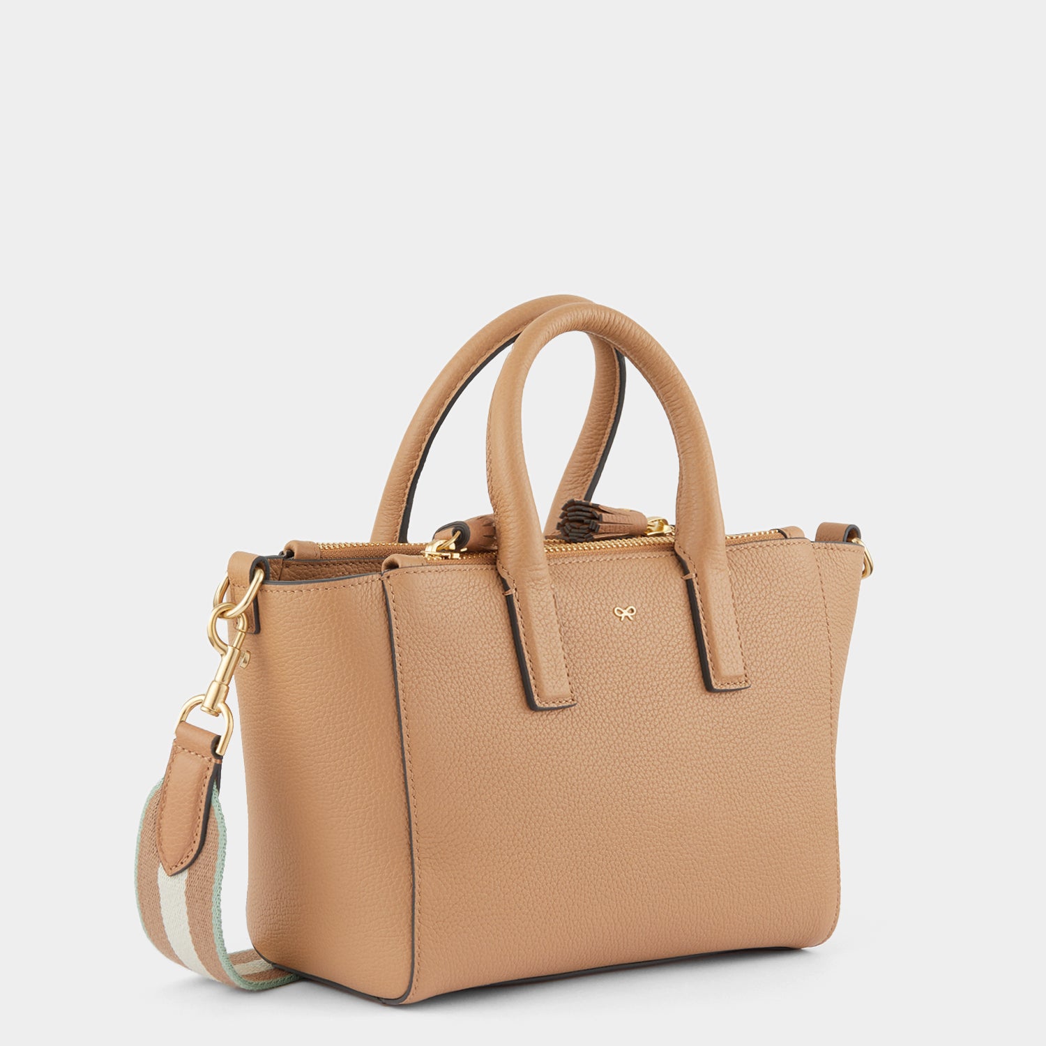 Micro Ebury -

                  
                    Tumbled Matt Leather in Nude -
                  

                  Anya Hindmarch UK
