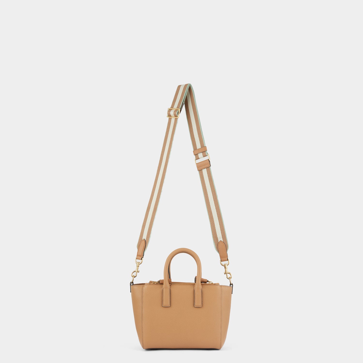 Micro Ebury -

                  
                    Tumbled Matt Leather in Nude -
                  

                  Anya Hindmarch UK
