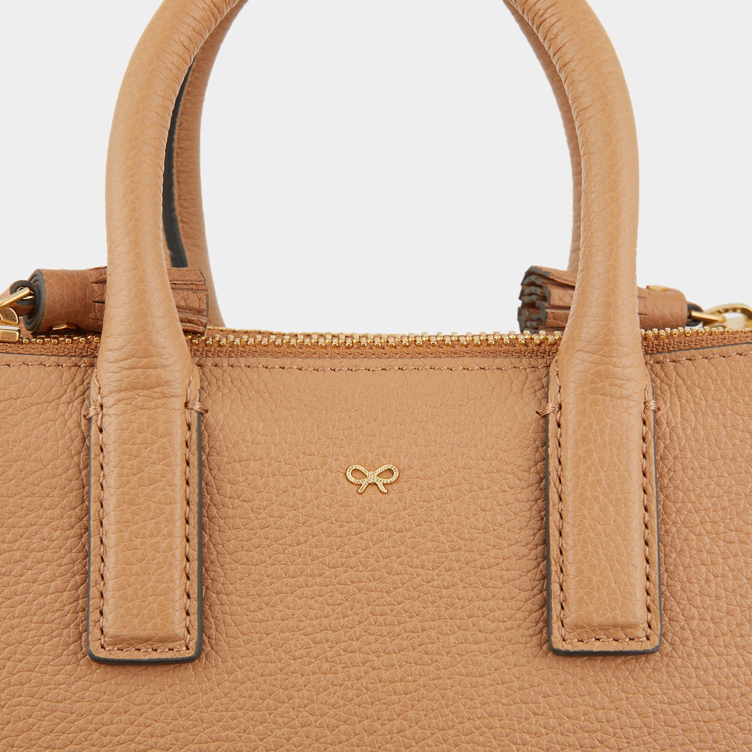 Micro Ebury -

                  
                    Tumbled Matt Leather in Nude -
                  

                  Anya Hindmarch UK
