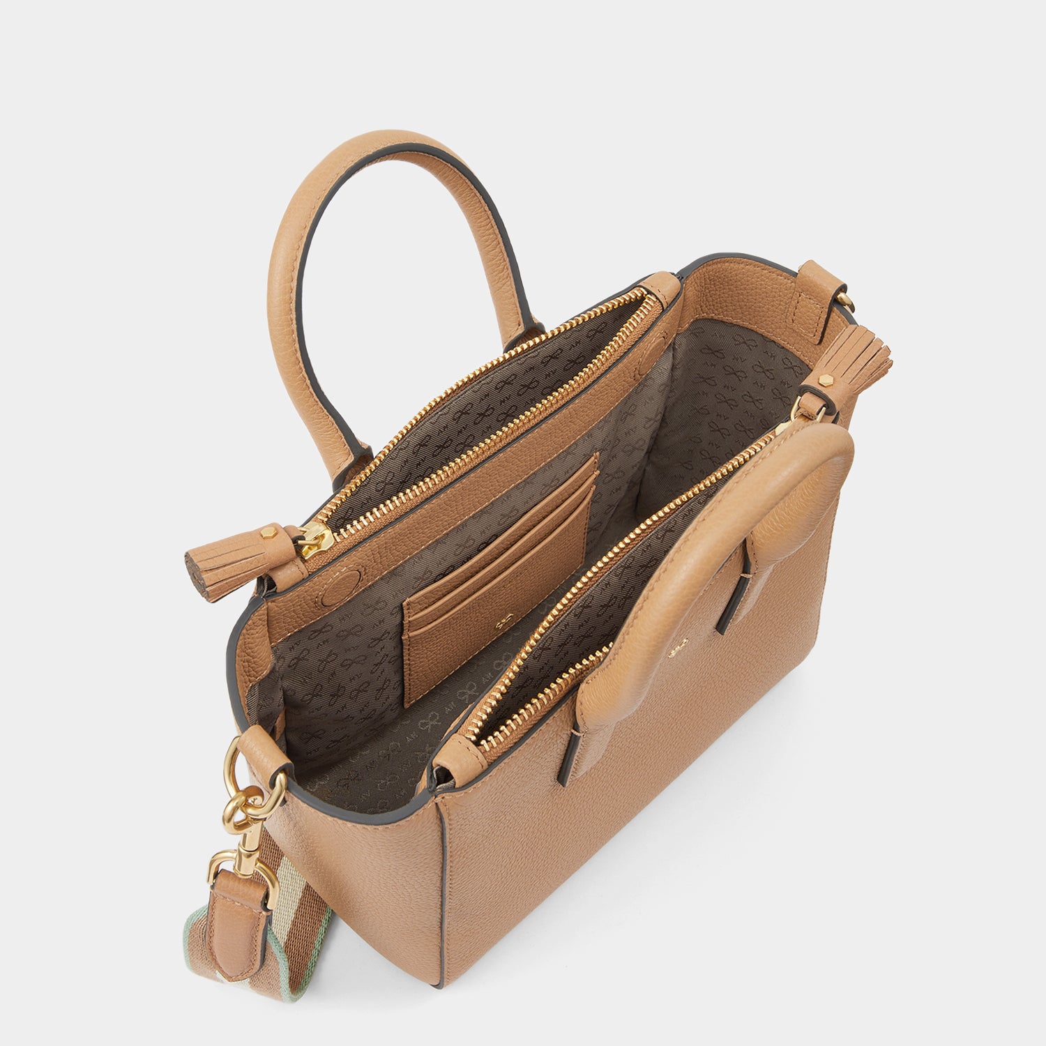 Micro Ebury -

                  
                    Tumbled Matt Leather in Nude -
                  

                  Anya Hindmarch UK
