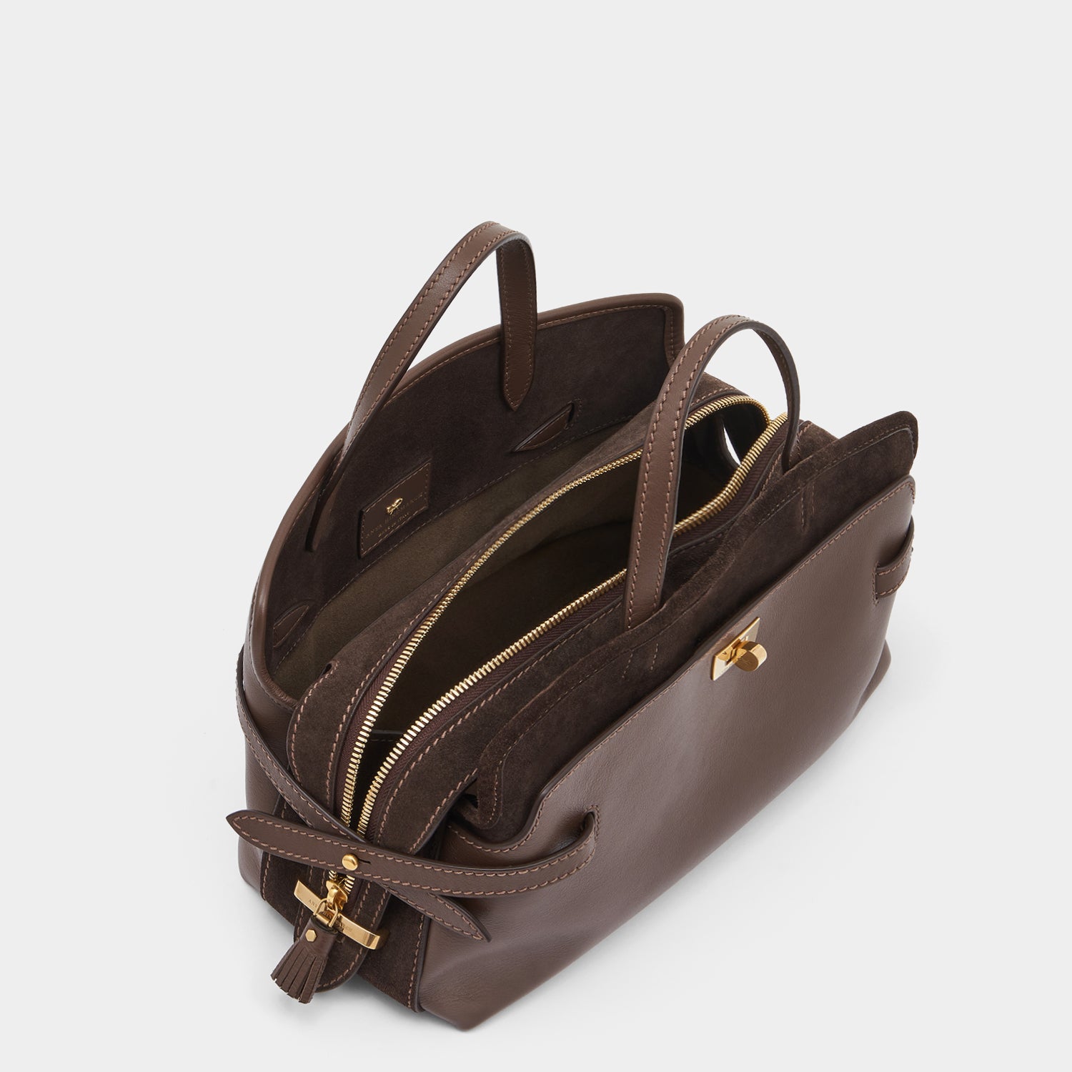 Wilson Cross-body -

                  
                    Calf Leather in Truffle -
                  

                  Anya Hindmarch UK
