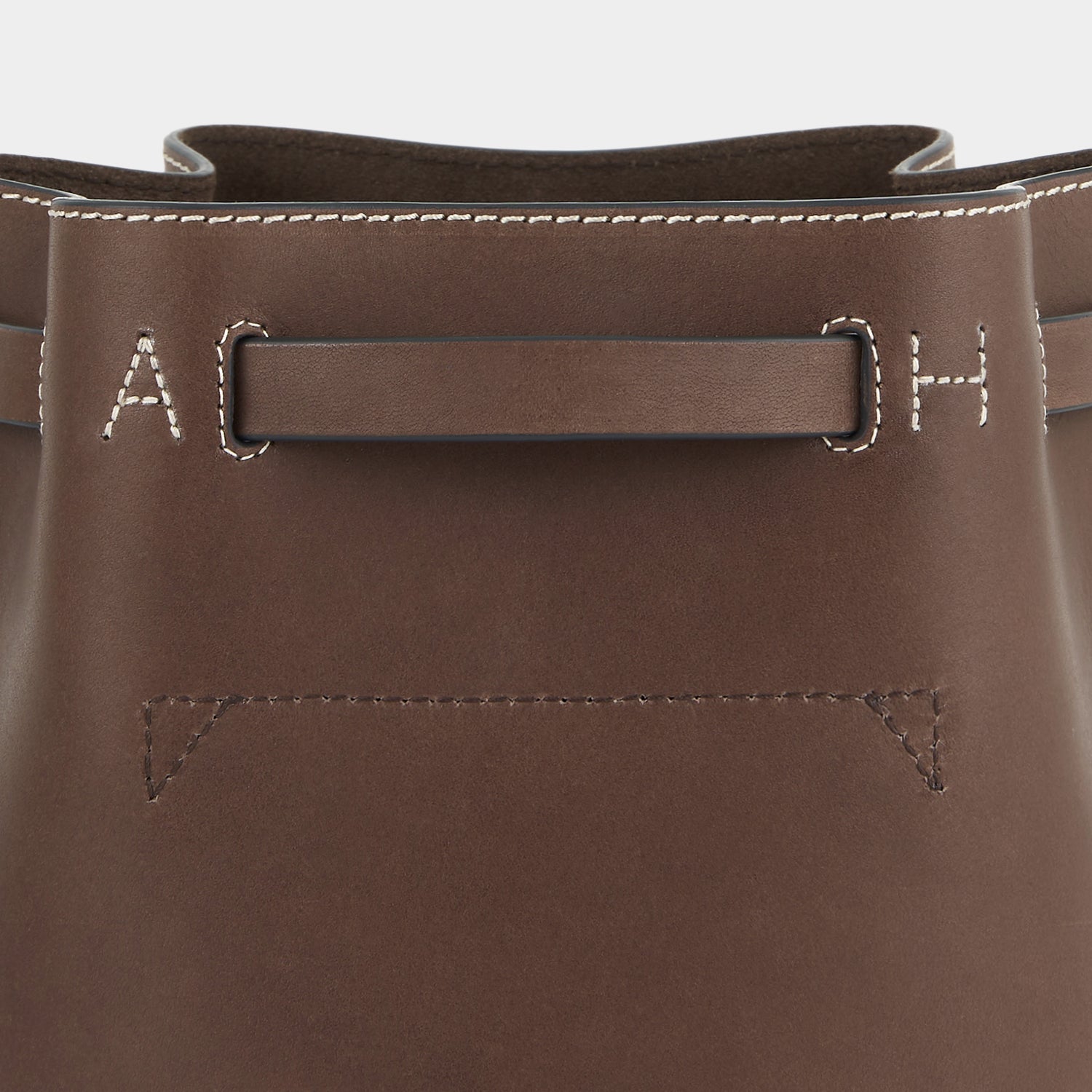 Return to Nature Small Bucket Bag -

                  
                    Compostable Leather in Truffle -
                  

                  Anya Hindmarch UK
