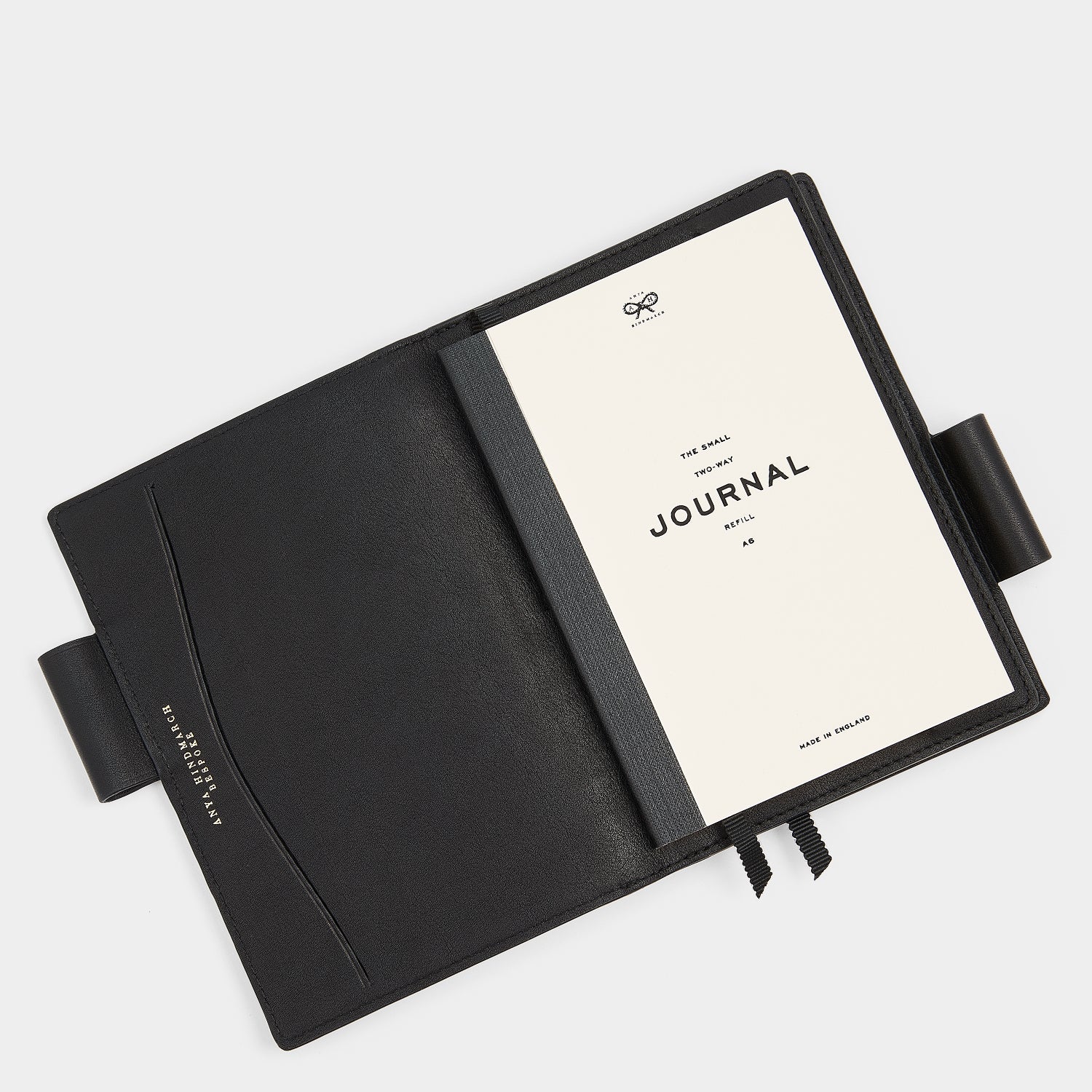 Bespoke A6 Two Way Journal -

                  
                    Butter Leather in Black -
                  

                  Anya Hindmarch UK
