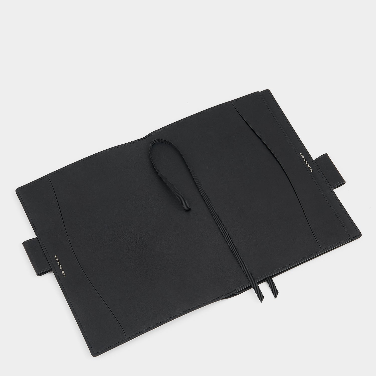 Bespoke A6 Two Way Journal -

                  
                    Butter Leather in Black -
                  

                  Anya Hindmarch UK

