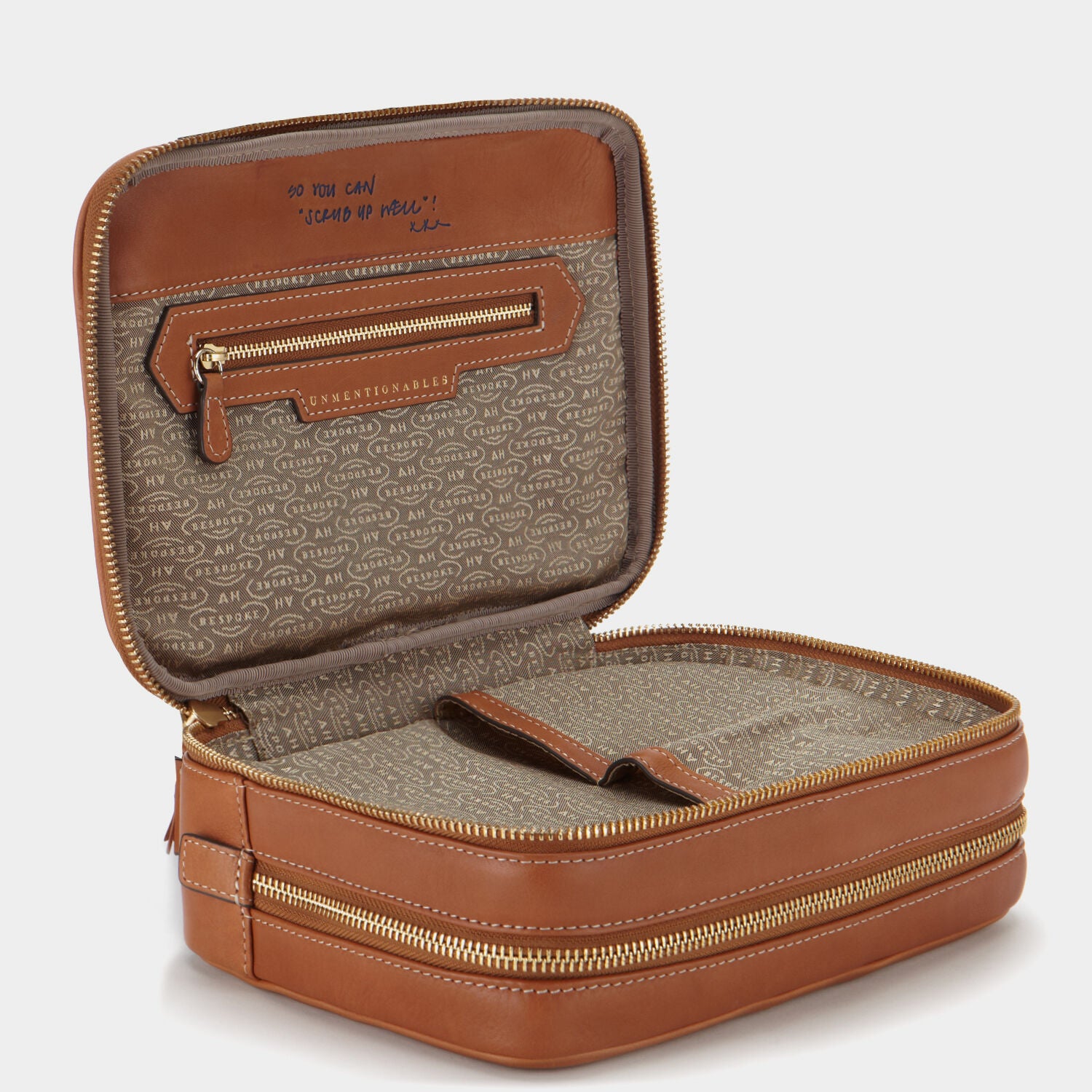 Bespoke Zipped Wash Bag -

                  
                    Butter Leather in Tan -
                  

                  Anya Hindmarch UK
