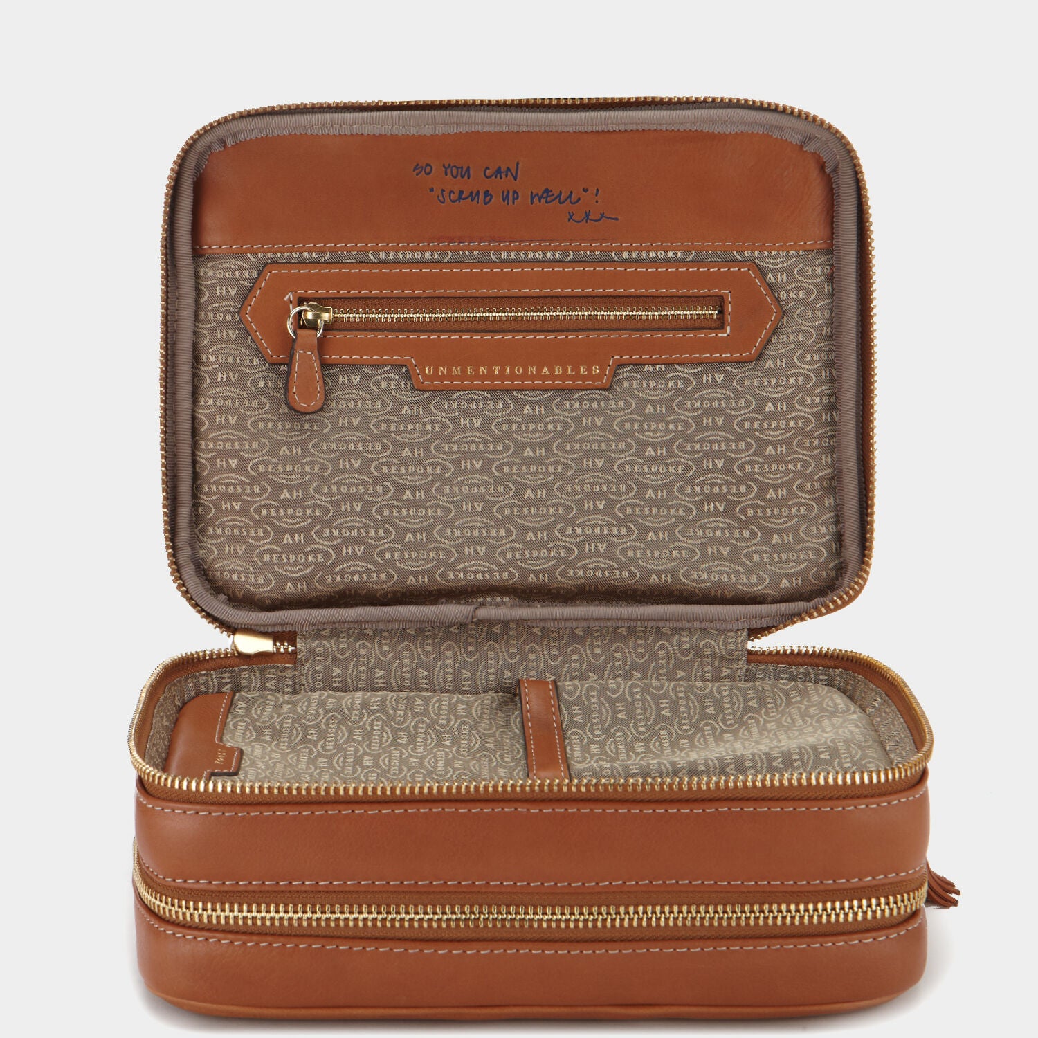 Bespoke Zipped Wash Bag -

                  
                    Butter Leather in Tan -
                  

                  Anya Hindmarch UK
