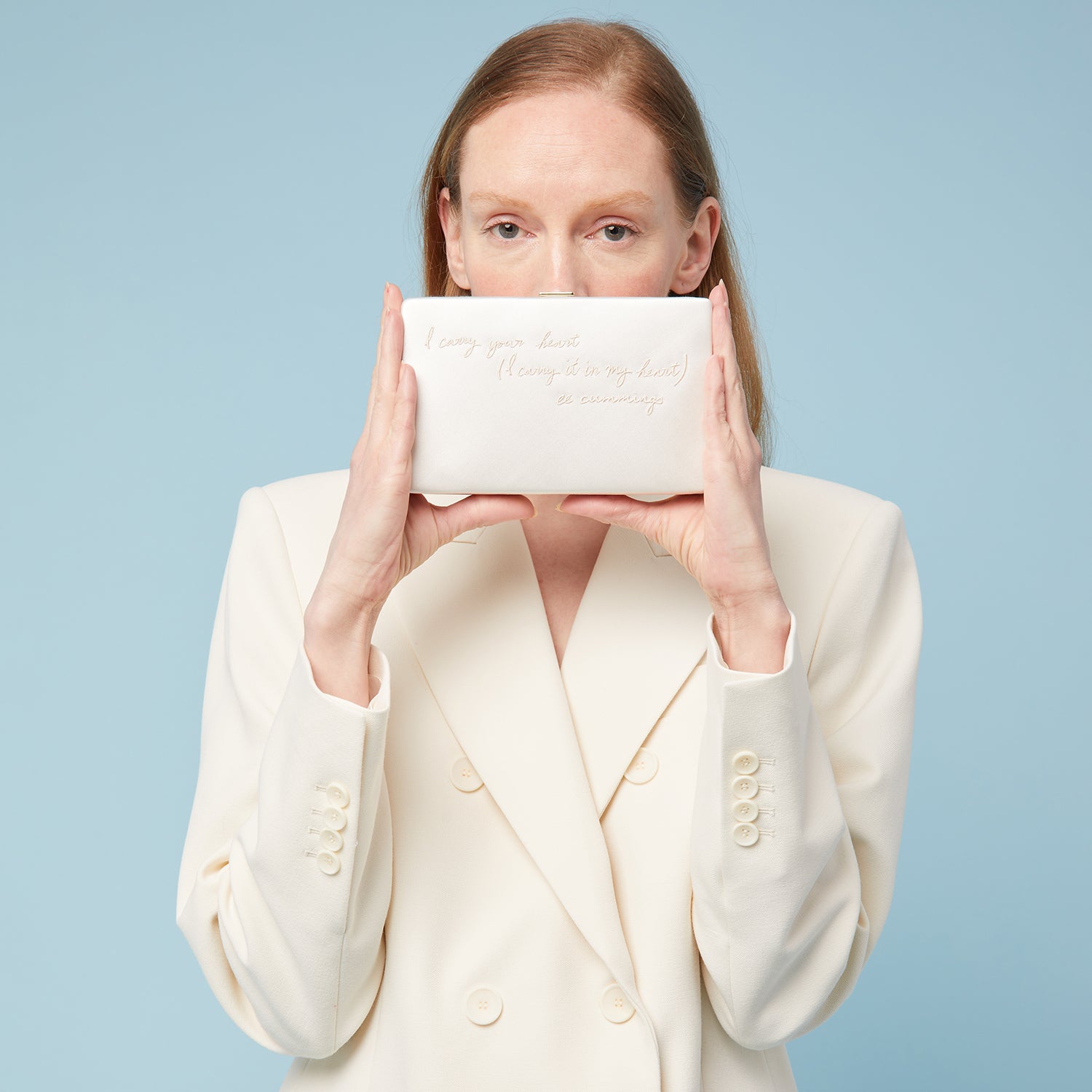 'I carry your heart' Clutch -

                  
                    Recycled Satin in Ivory -
                  

                  Anya Hindmarch UK
