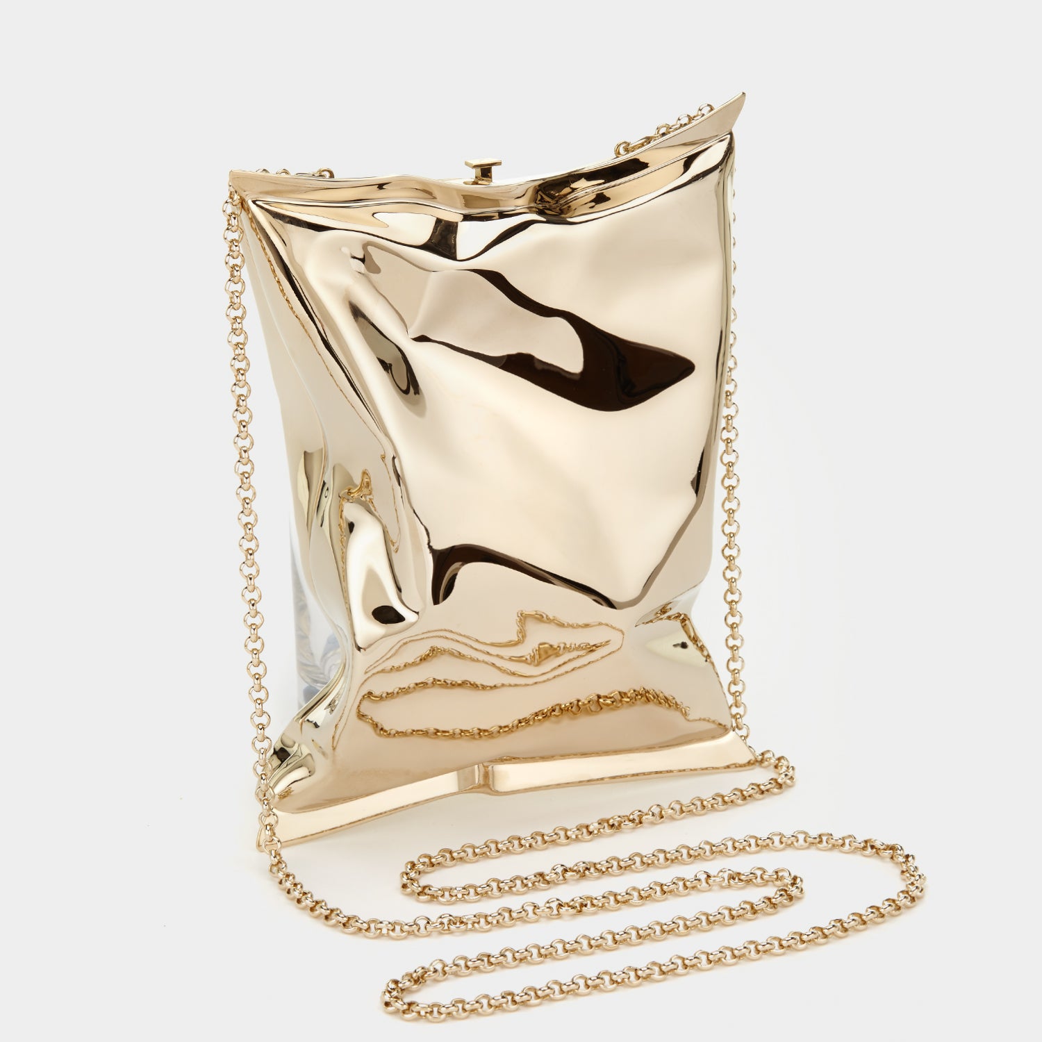 Crisp Packet Clutch -

                  
                    Brass in Pale Gold -
                  

                  Anya Hindmarch UK
