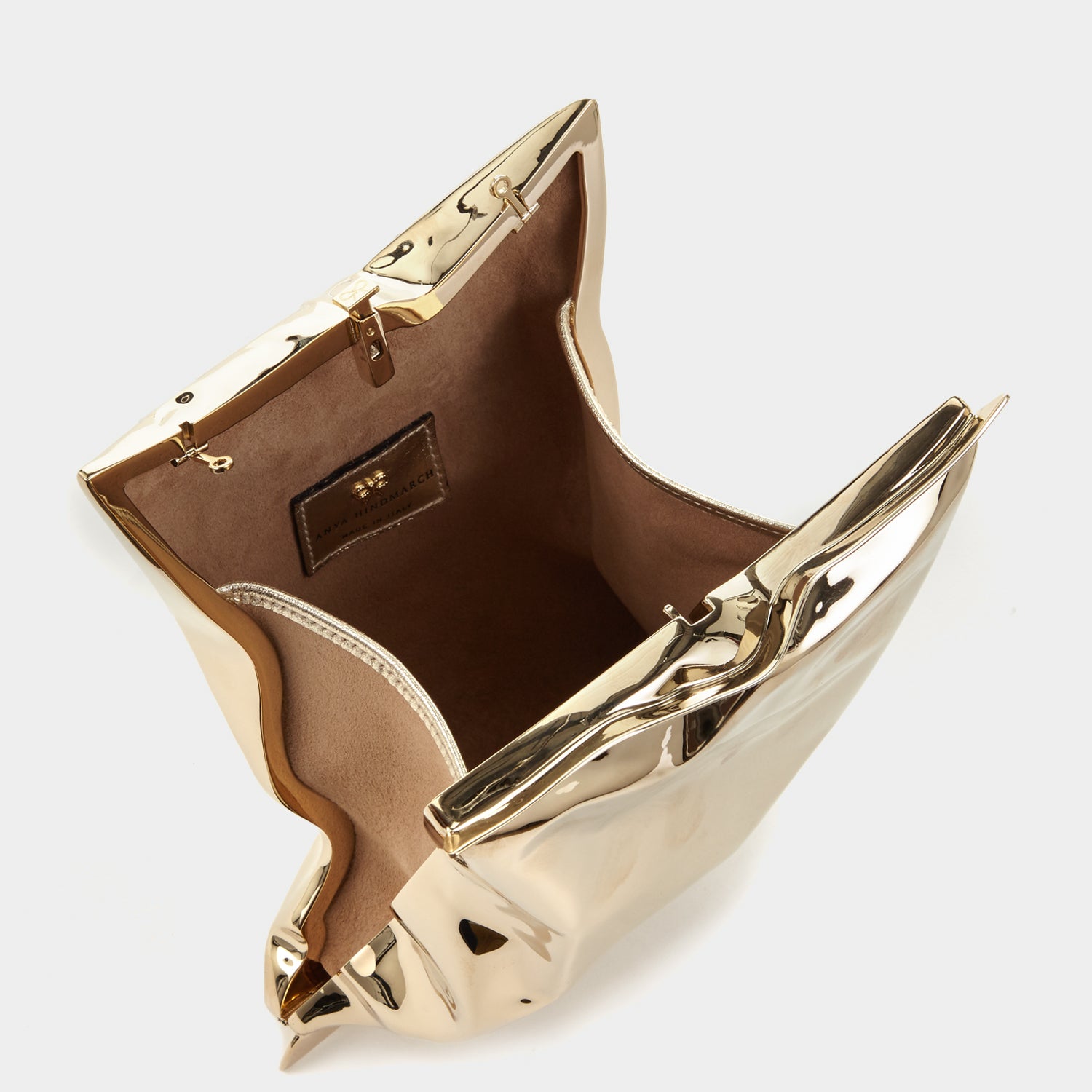 Crisp Packet Clutch -

                  
                    Brass in Pale Gold -
                  

                  Anya Hindmarch UK
