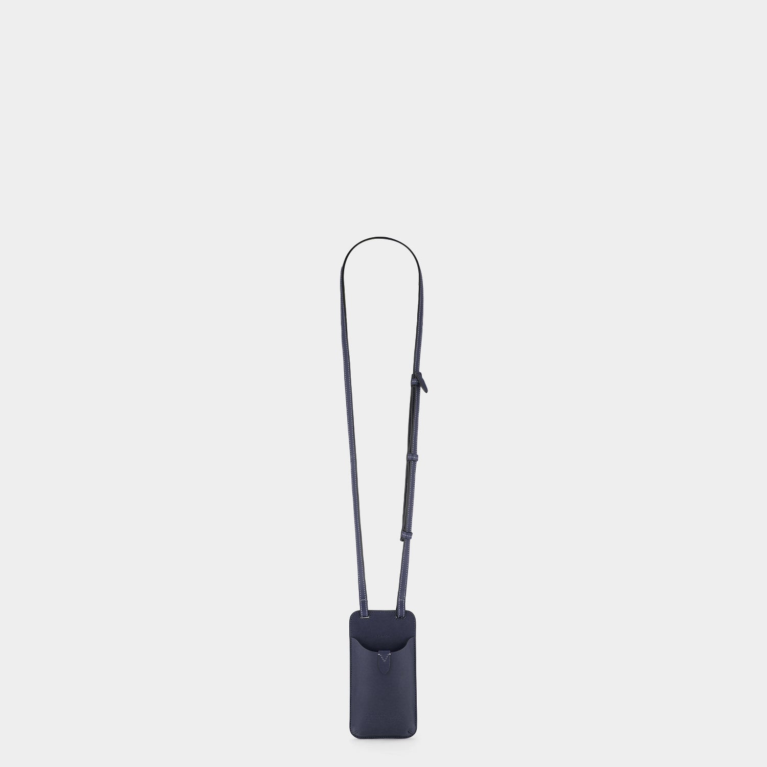 Return to Nature Phone Pouch on Strap -

                  
                    Compostable Leather in Marine -
                  

                  Anya Hindmarch UK
