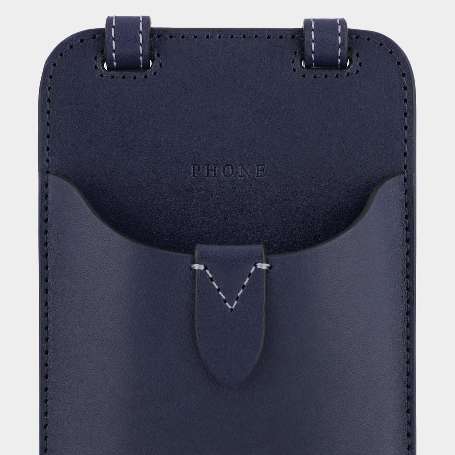 Return to Nature Phone Pouch on Strap -

                  
                    Compostable Leather in Marine -
                  

                  Anya Hindmarch UK

