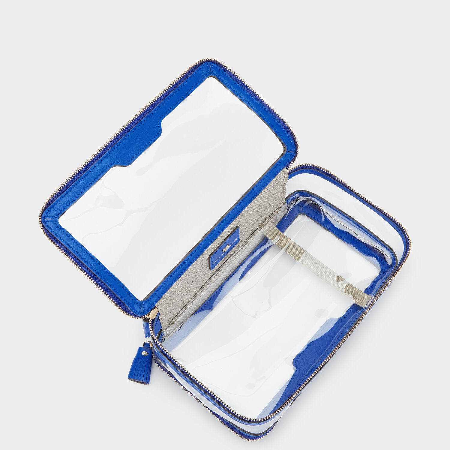 In-Flight Case -

                  
                    Circus Leather in Electric Blue -
                  

                  Anya Hindmarch UK
