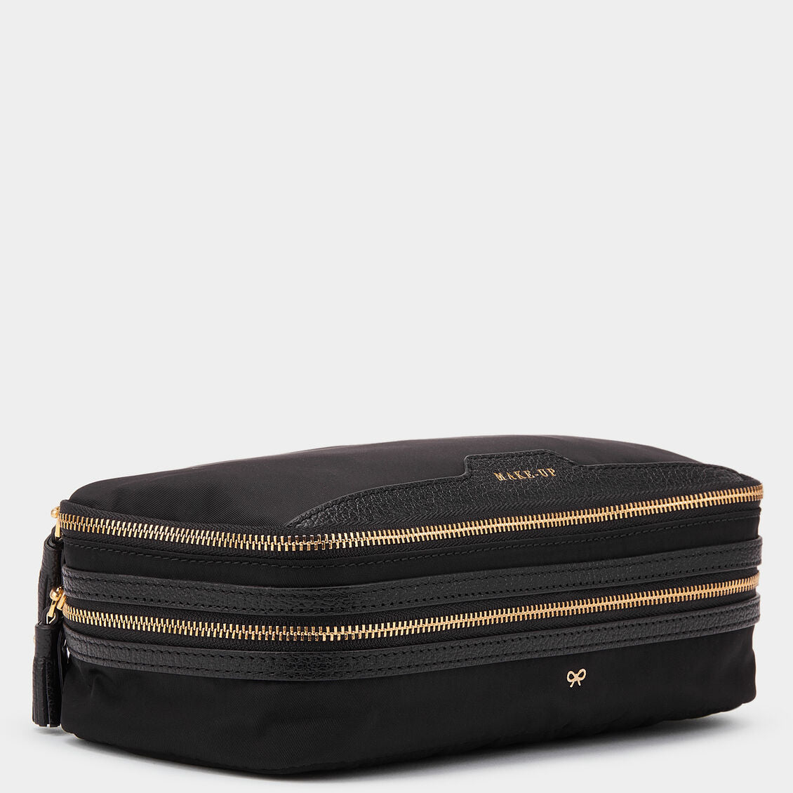 Make-Up Pouch -

                  
                    ECONYL® Regenerated Nylon in Black -
                  

                  Anya Hindmarch UK
