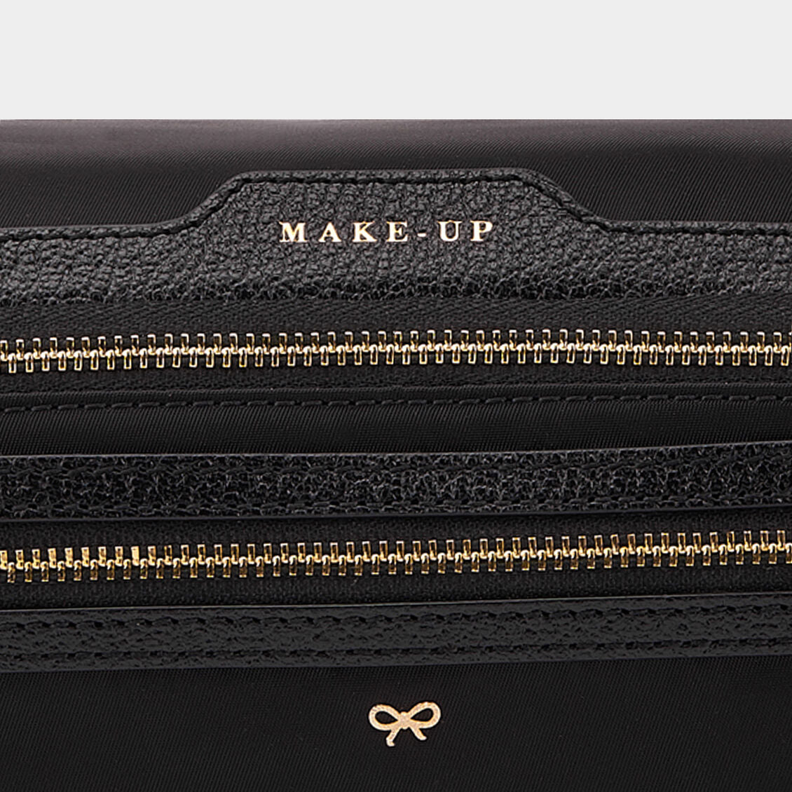 Make-Up Pouch -

                  
                    ECONYL® Regenerated Nylon in Black -
                  

                  Anya Hindmarch UK
