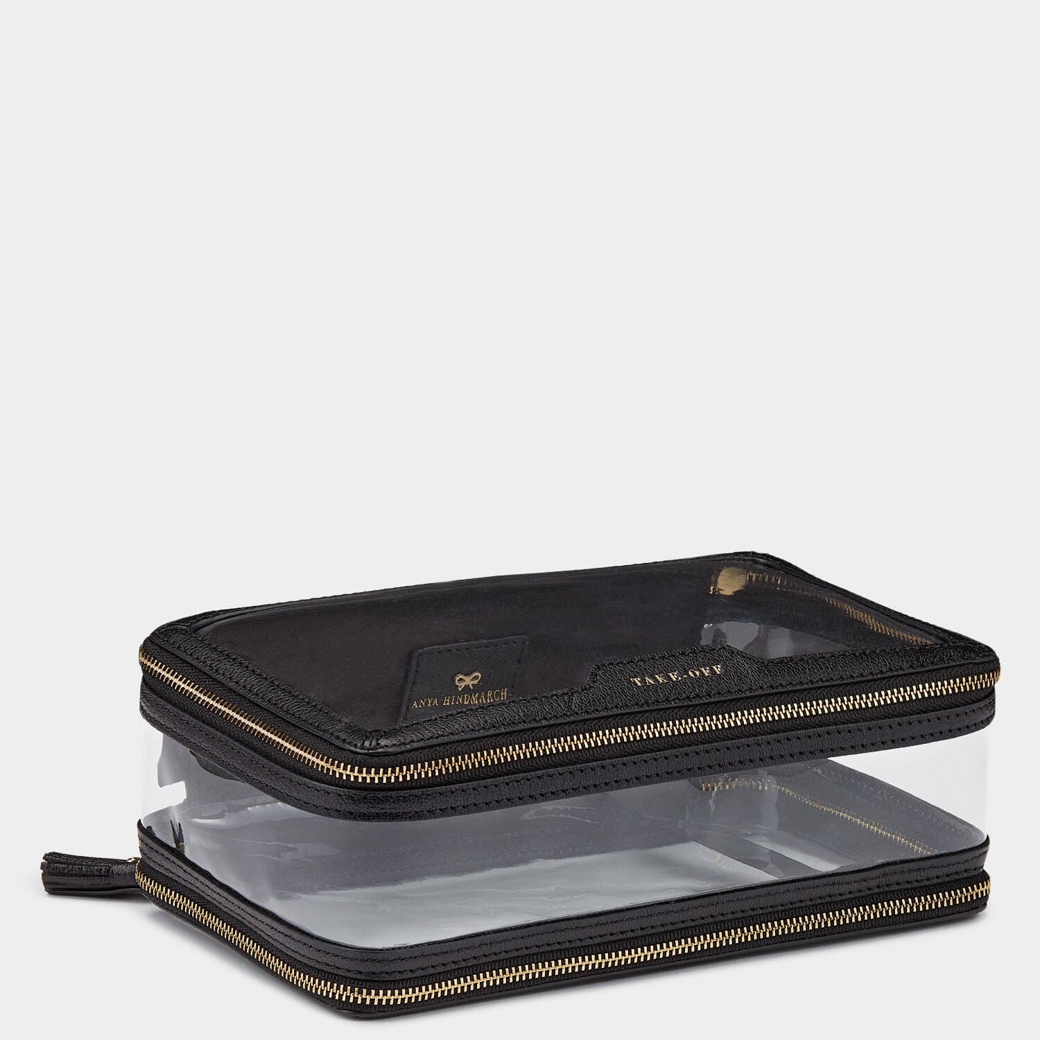 In-Flight Case -

                  
                    Capra in Black -
                  

                  Anya Hindmarch UK
