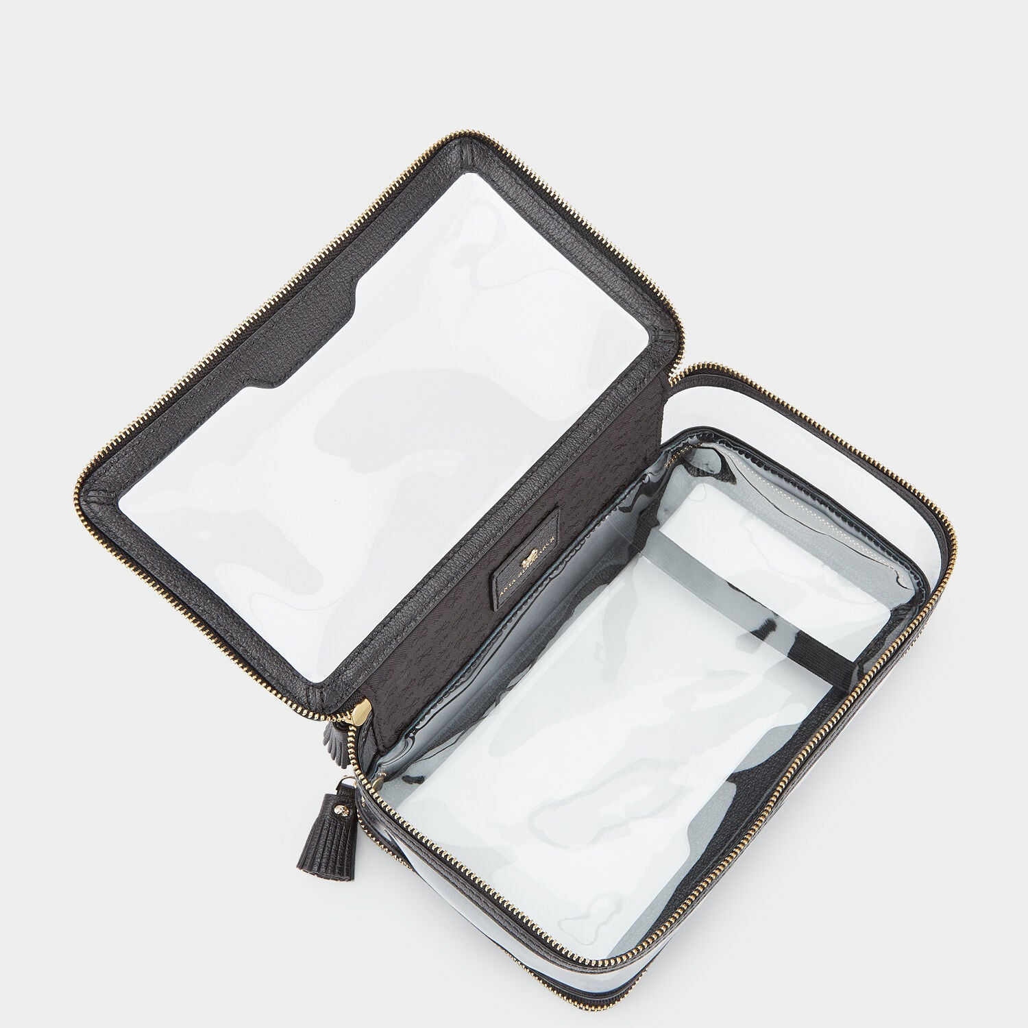 In-Flight Case -

                  
                    Capra in Black -
                  

                  Anya Hindmarch UK
