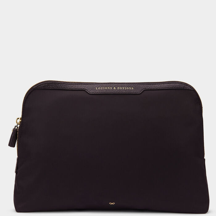 Lotions and Potions Pouch -

                  
                    ECONYL® in Black -
                  

                  Anya Hindmarch UK

