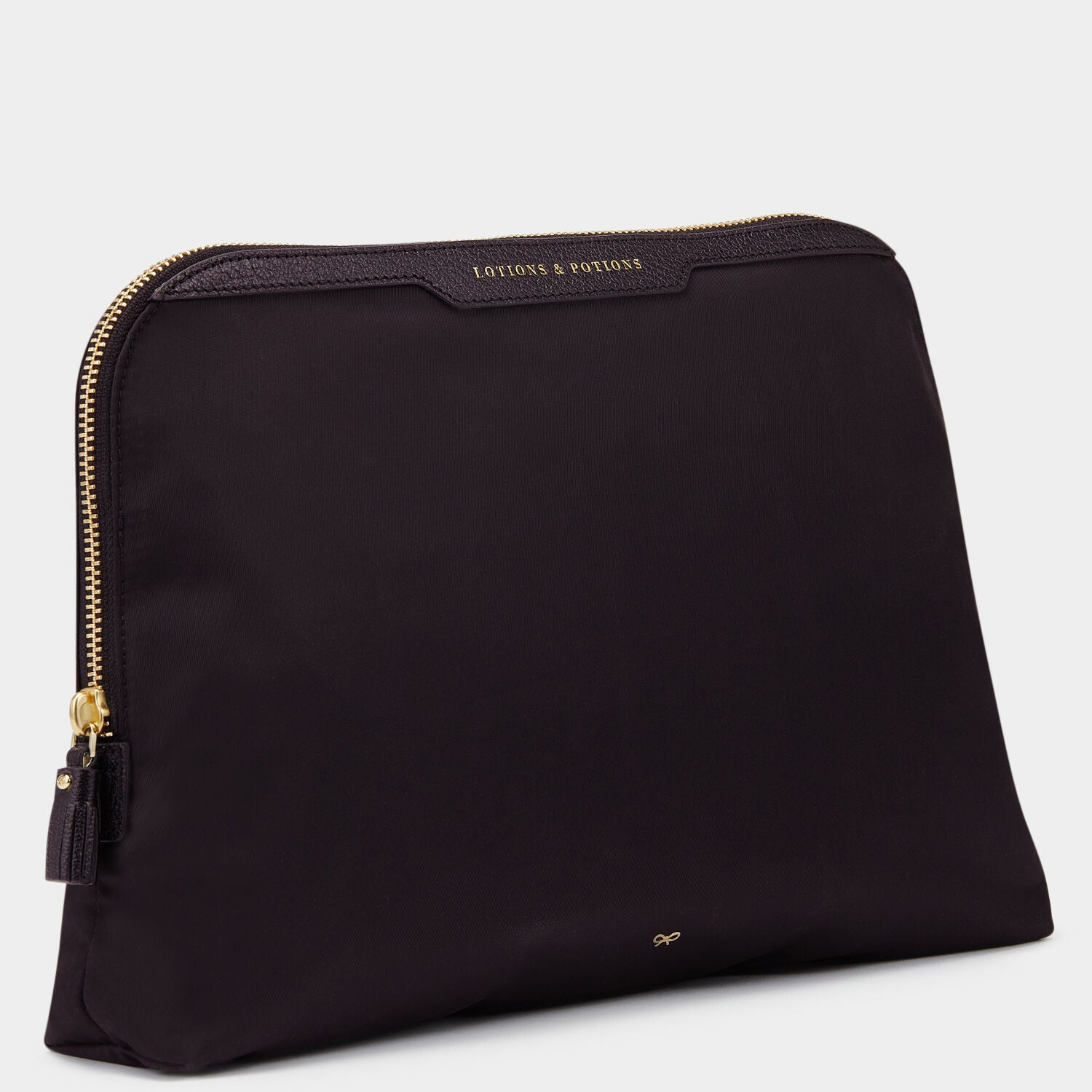 Lotions and Potions Pouch -

                  
                    ECONYL® in Black -
                  

                  Anya Hindmarch UK
