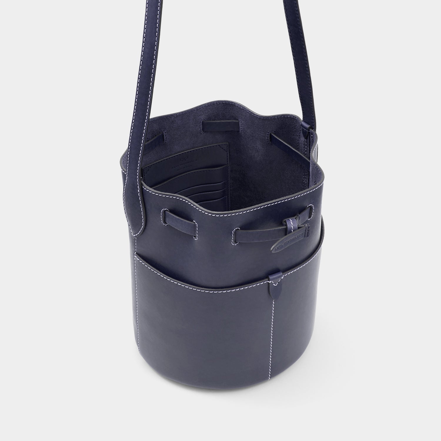 Return to Nature Small Bucket Bag -

                  
                    Compostable Leather in Marine -
                  

                  Anya Hindmarch UK
